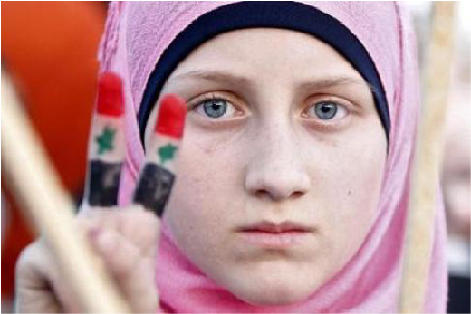 A young girl holding up the peace symbol with the Syrian flag on her fingers