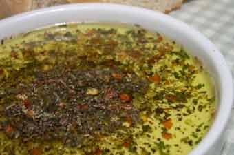 A cup of bread dip mix