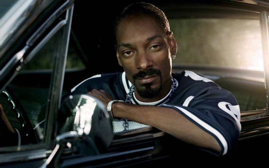 Snoop Dogg sitting in a car